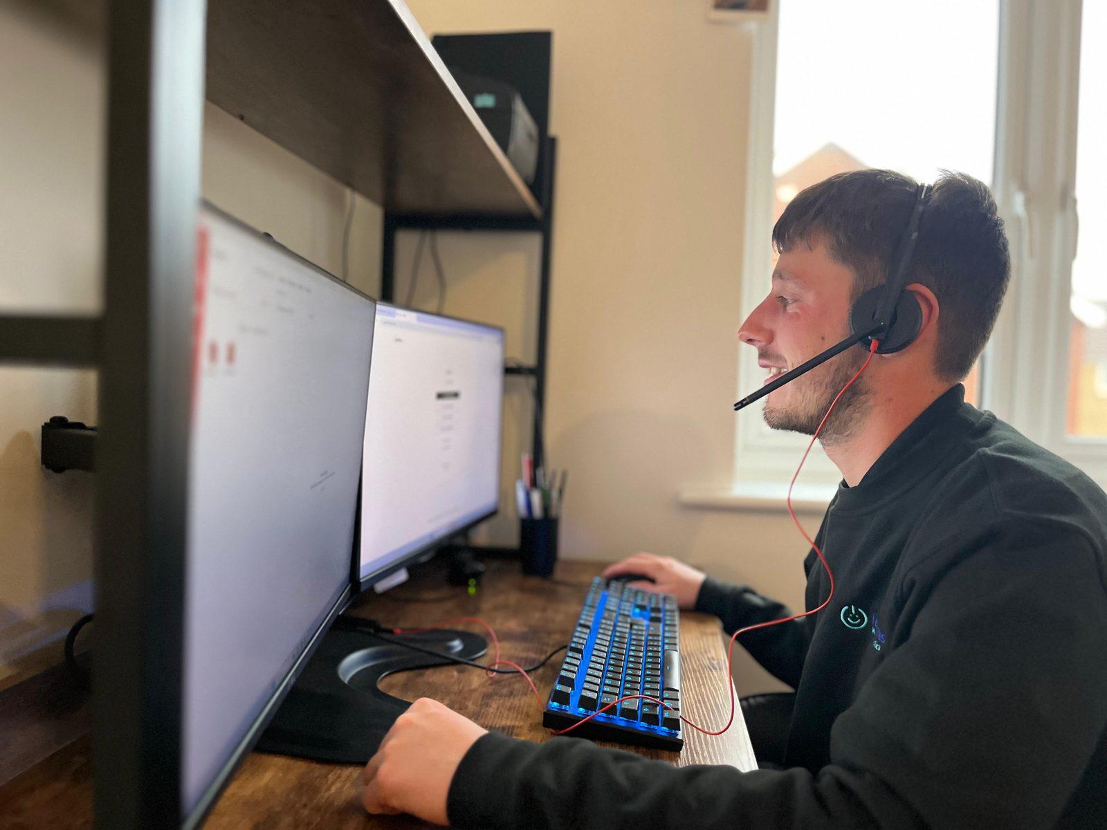 TechMates expert working at their desk with dual monitors, providing professional tech support in Boston, Lincolnshire