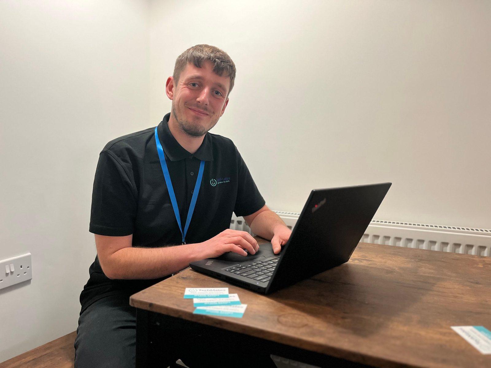 TechMates founder working at a laptop, ready to help customers with their tech needs in Boston, Lincolnshire