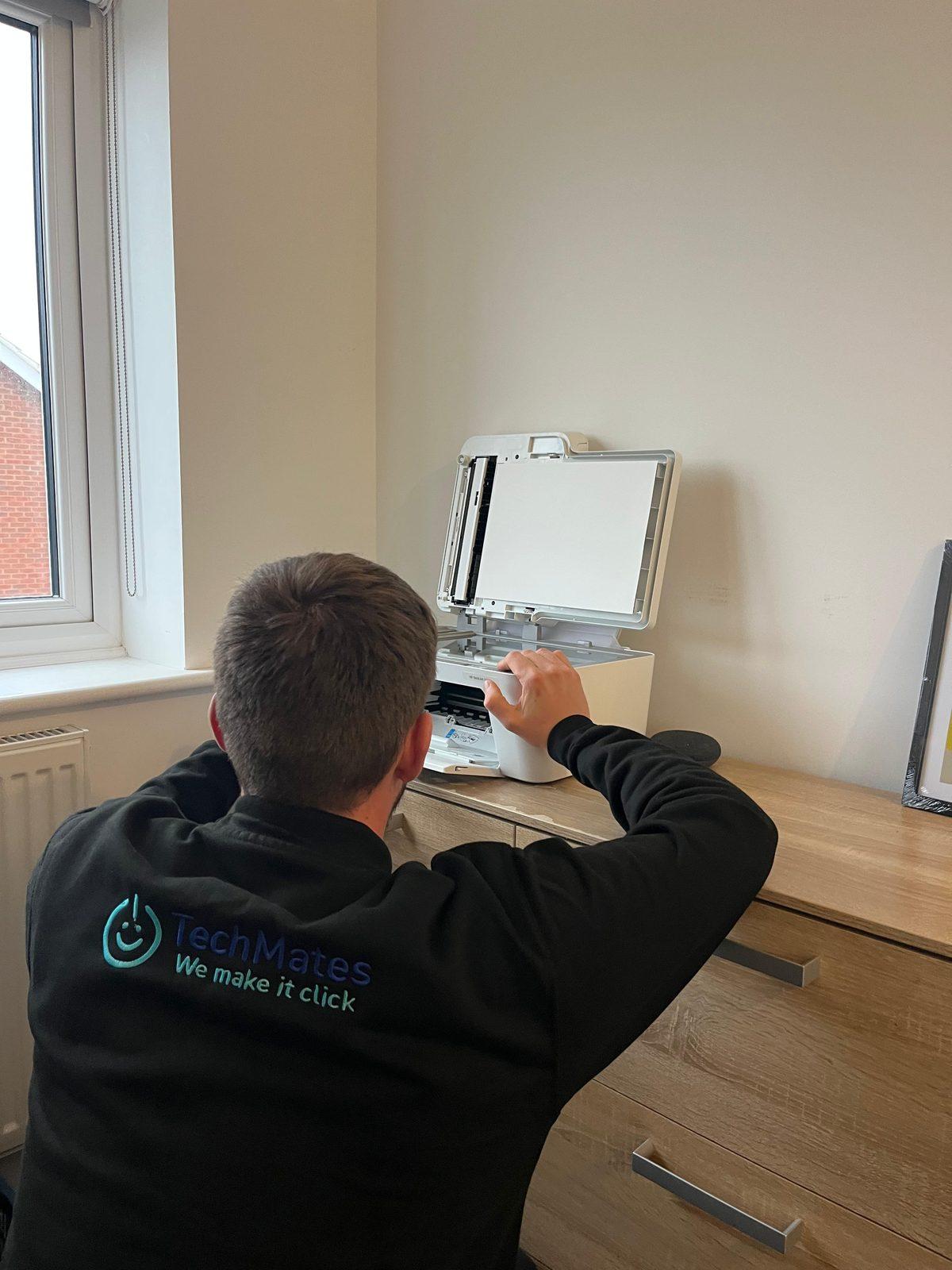 TechMates Expert servicing a printer for a customer in Boston, Lincolnshire